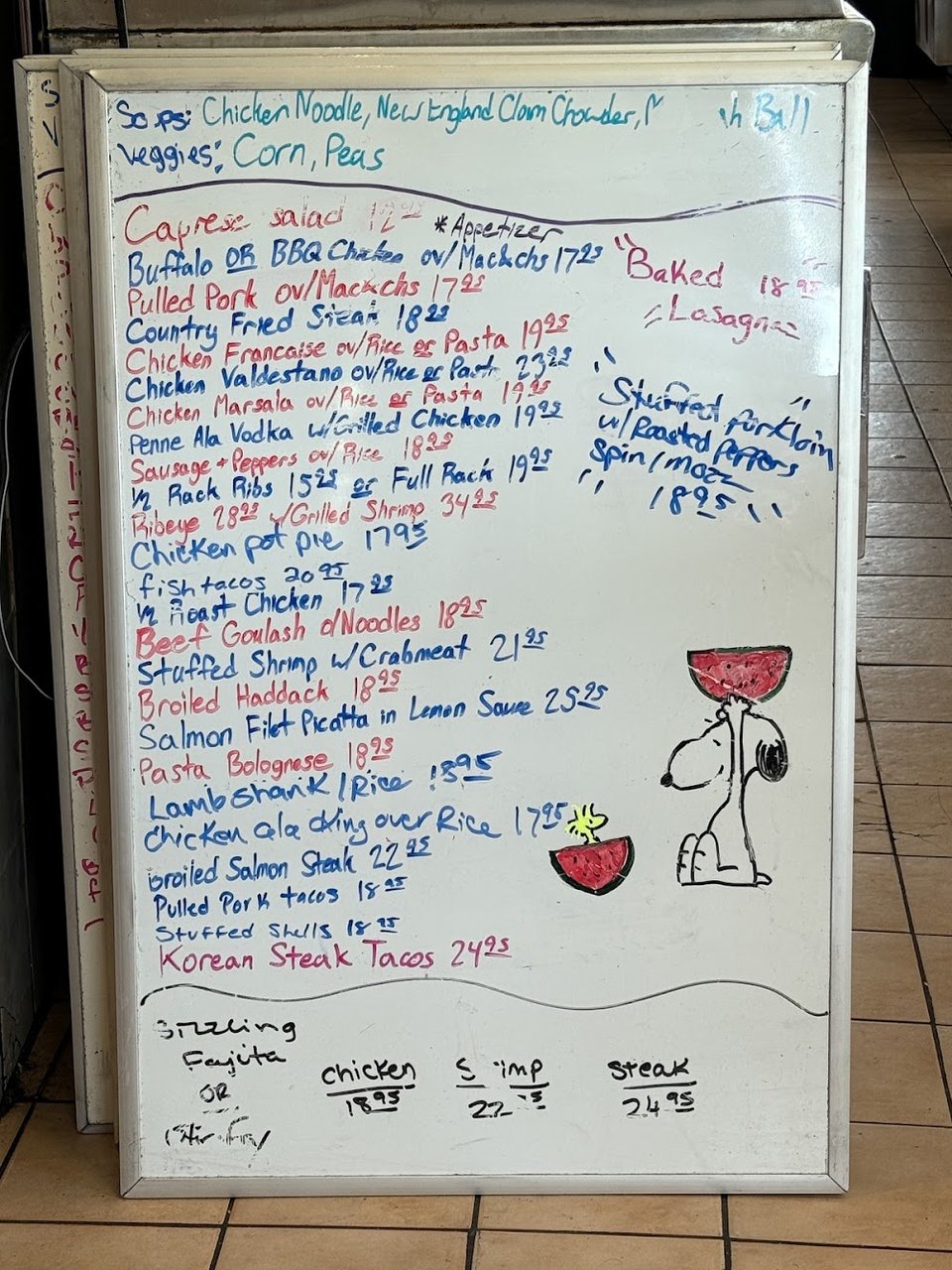 Printed menu page with sandwiches and breakfast sides.